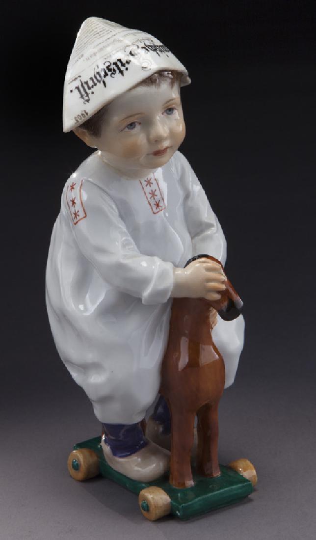 Rare Meissen "Boy on Toy Horse" porcelain figure: Rare Meissen "Boy on Toy Horse" porcelain figure from the Jugendstil Period circa 1905, with blue crossed swords mark and model # W120. Original model by Konrad Hentschel. 6.75"H, Circa - 1905.