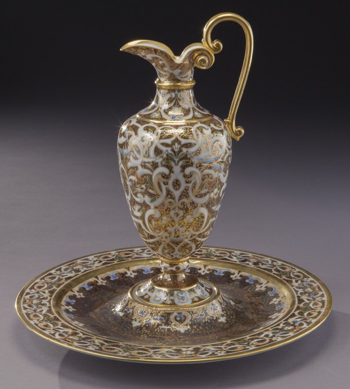 Royal Vienna ewer and fitted underplate,: Royal Vienna ewer and fitted underplate, each decorated in Moorish scrolling design. Each marked. Overall: 13.5"H, Circa - 1900. PROVENANCE: From the Estate of John W. Lolley, Monroe, Louisiana.