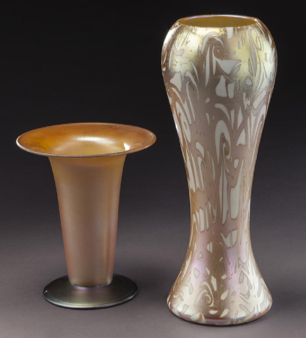 (2) Durand glass items,: (2) Durand glass items, including: (1) corset form gold on opal King Tut; (1) footed trumpet vase in marigold. Tallest: 10.25"H, Circa - 1925. PROVENANCE: From the Estate of John W. Lolley, Monroe, Lo
