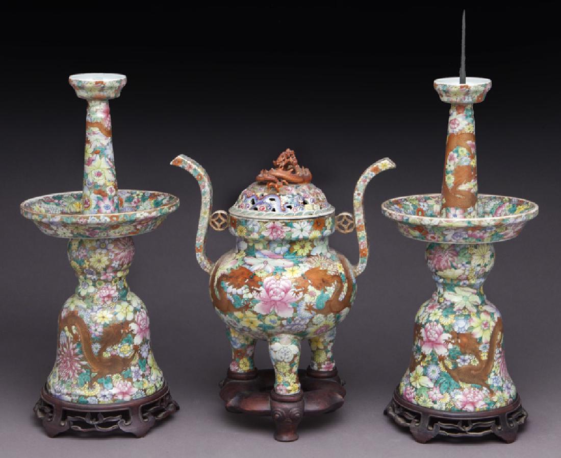 (3) Chinese Republic famille rose porcelain altar: (3) Chinese Republic famille rose porcelain altar pieces, including: a pair of candle sticks and an incense burner. Each with fine enamel depicting dragons and flowers, six character seal mark to unde