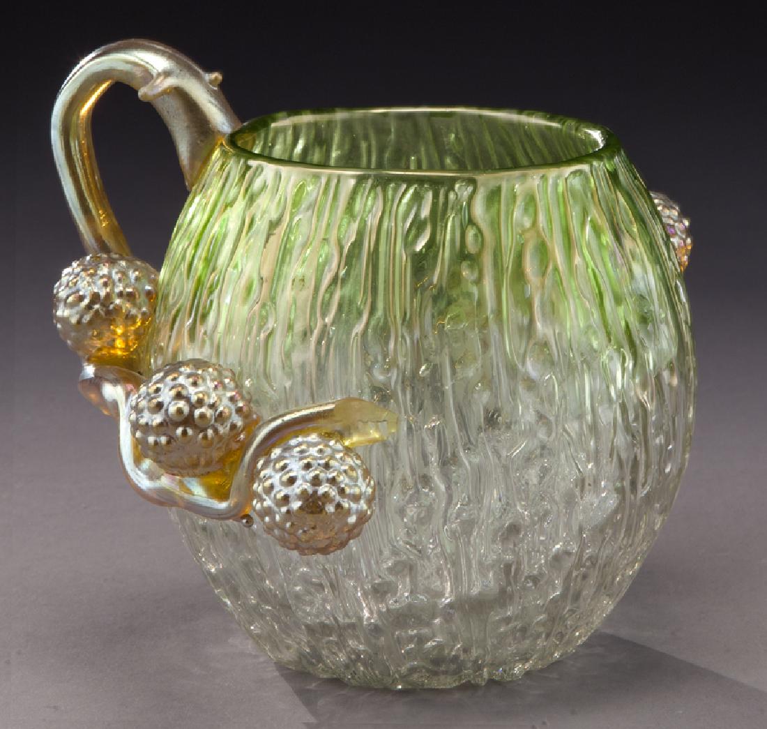 Loetz applied glass vase,: Loetz applied glass vase, green bark skin with iridescent gold handles and fruit. 5"H x 5.75"W, Circa - 1900. PROVENANCE: From the Estate of John W. Lolley, Monroe, Louisiana.