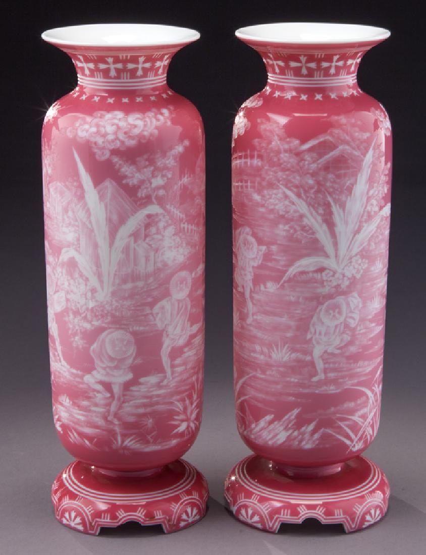 Pr. Webb intaglio cut vases,: Pr. Webb intaglio cut vases, footed cranberry with Japanesque design. Signed, "Thomas Webb & Sons". PROVENANCE: Paul Windorf to the Lolley Collection. 10.25"H, Circa - 1890. PROVENANCE: From the Estat
