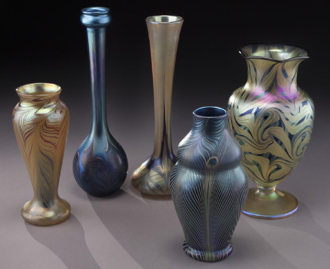 (5) Signed Orient & Flume iridescent glass vases: (5) Signed Orient & Flume iridescent glass vases in various form and color. Tallest: 11.5"H, Circa - Late 20th C. PROVENANCE: From the Estate of John W. Lolley, Monroe, Louisiana.