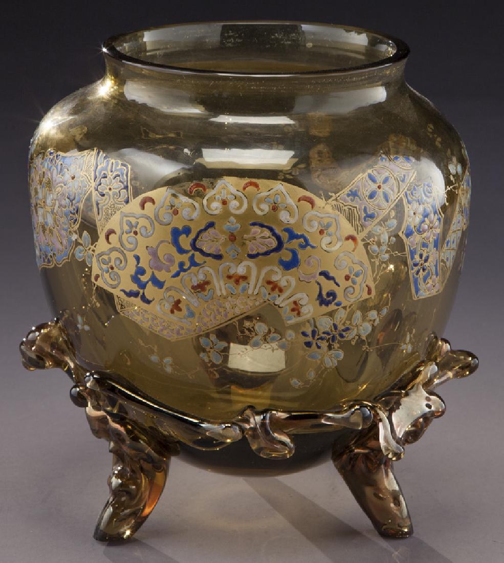 Early Galle glass bowl,: Early Galle glass bowl, footed amber with Moorish enameled décor adorned with rigaree feet and waist. Signed, "Cristallerie E Galle Nancy". Possibly Auguste Jean. 8.75"H, Circa - 1890. PROVENANCE