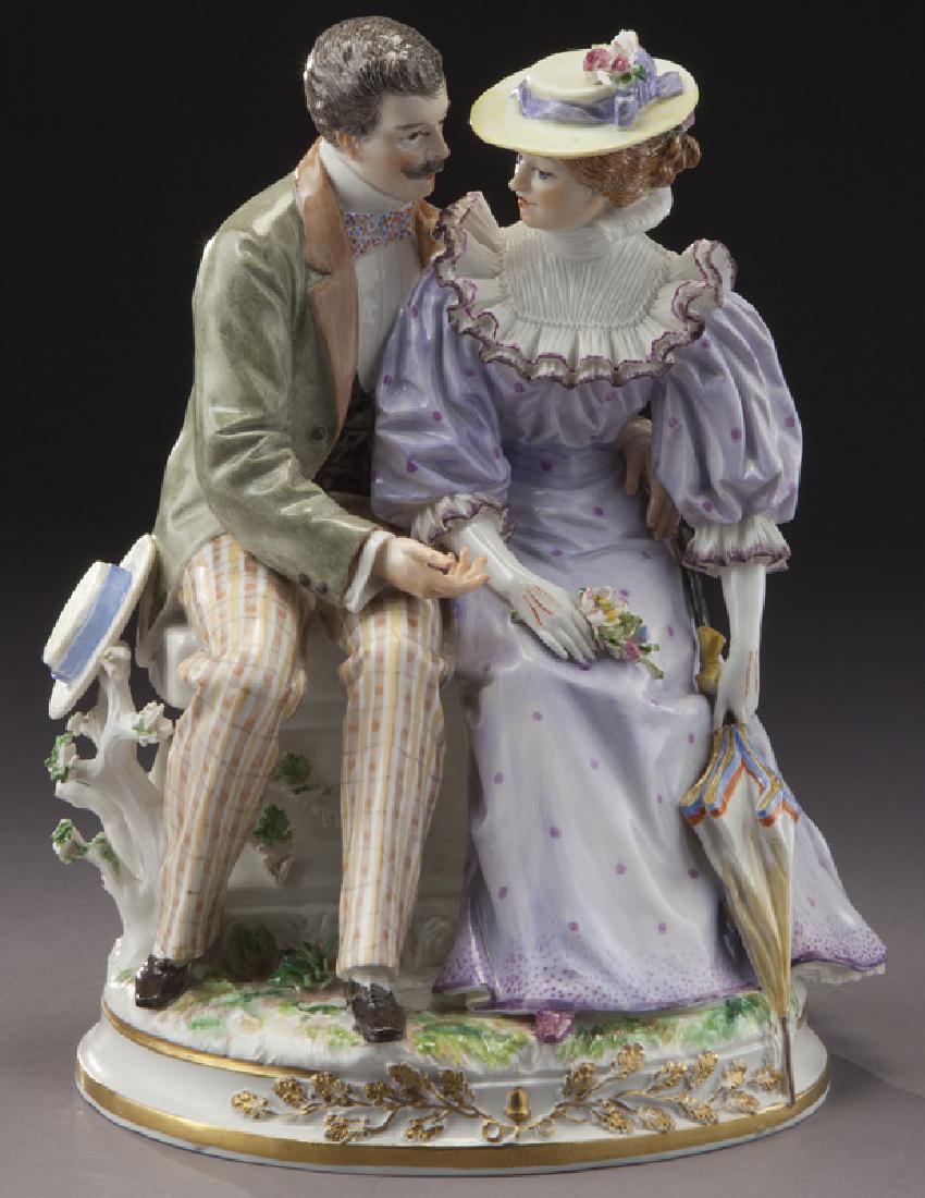 Large Meissen "Courting Couple" porcelain figural: Large Meissen "Courting Couple" porcelain figural group, originally modeled by Romanus Andresen c. 1874. Firing crack across underside of base. Marked with canceled crossed sword mark in blue. 9"H x 7