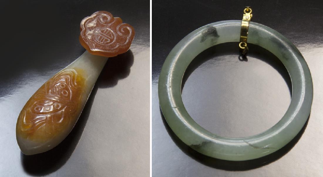 (2) Pcs. Chinese Qing carved jadeite,: (2) Pcs. Chinese Qing carved jadeite, including: (1) ring and (1) belt buckle. Ring: 2.125" Dia.; Belt buckle; 3"H. Circa - 19th C.