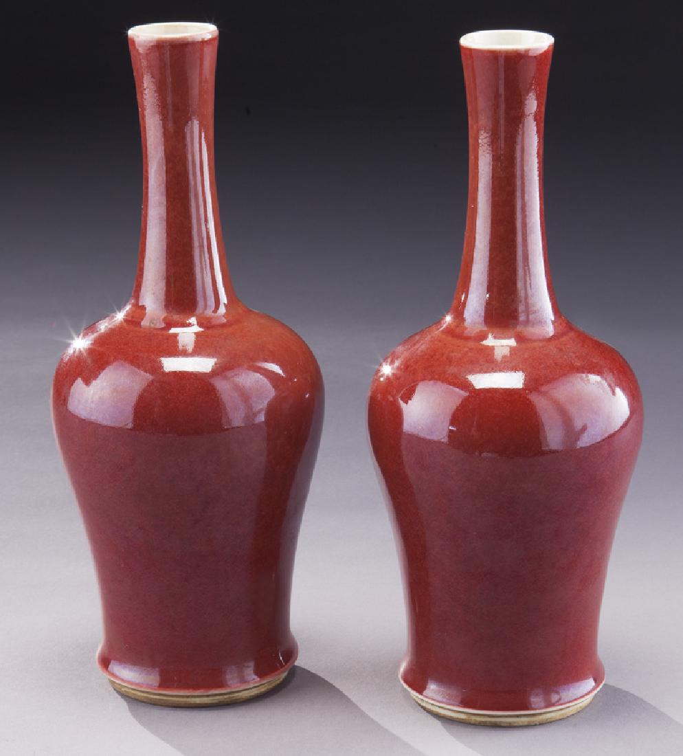 Pr. Chinese oxblood porcelain amphora.: Pr. Chinese oxblood porcelain amphora. 9.25"H, Circa - 20th C.