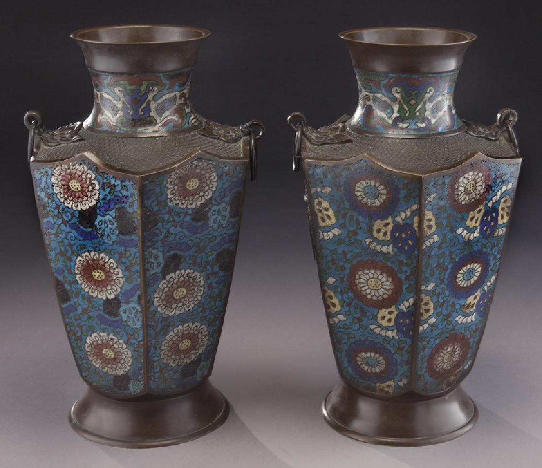 Pr. Chinese champleve vases,: Pr. Chinese champleve vases, the banded neck over scalloped paneled base decorated with stylized flowers to blue ground. 15.25"H, Circa - 19th C.