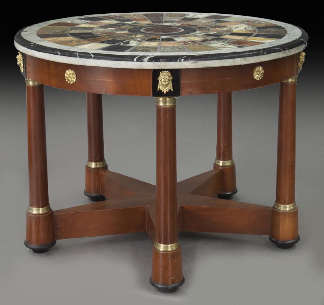 French Empire-style center table with specimen: French Empire-style center table with specimen marble top, the circular top with radiating design over frieze with gilt bronze mask and rosette mounts raised on flared columnar legs joined by a star-s