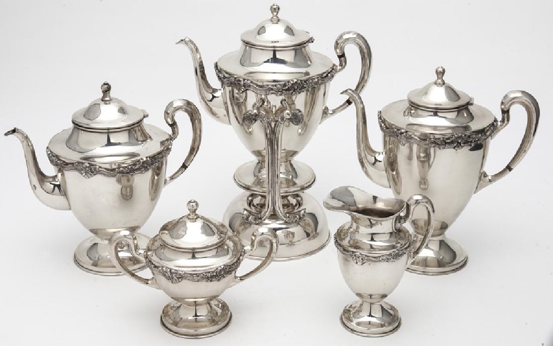 (5) Pcs. Mexican sterling silver tea & coffee: (5) Pcs. Mexican sterling silver tea & coffee service, comprising: (1) coffee pot; (1) tea pot; (1) lidded sugar; (1) creamer; (1) hot water kettle with stand. Each marked to underside, "Sterling Mexi