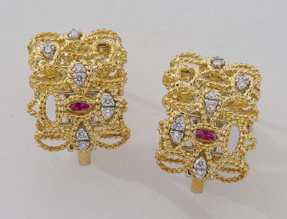 Roberto Coin 18K gold and diamond earrings: Roberto Coin 18K gold and diamond earrings with diamond accents and French clip backs. Roberto Coin signature hidden ruby . Stamped, "18K (star) 1226 VI Italy". 14.0 grams. .75", Circa - 20th C.