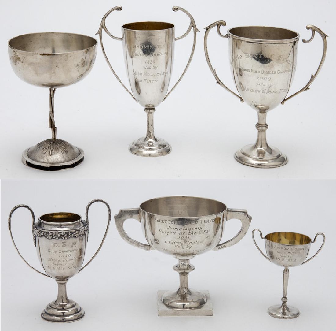 (6) Chinese silver trophies.: (6) Chinese silver trophies. Marked Luen Wo, Tuck Change, M. Silver, Zee Sung Dun Sterling. 25.7 ozt. (798.3 g.). Tallest: 6.375"H, Circa - 1926-1936.