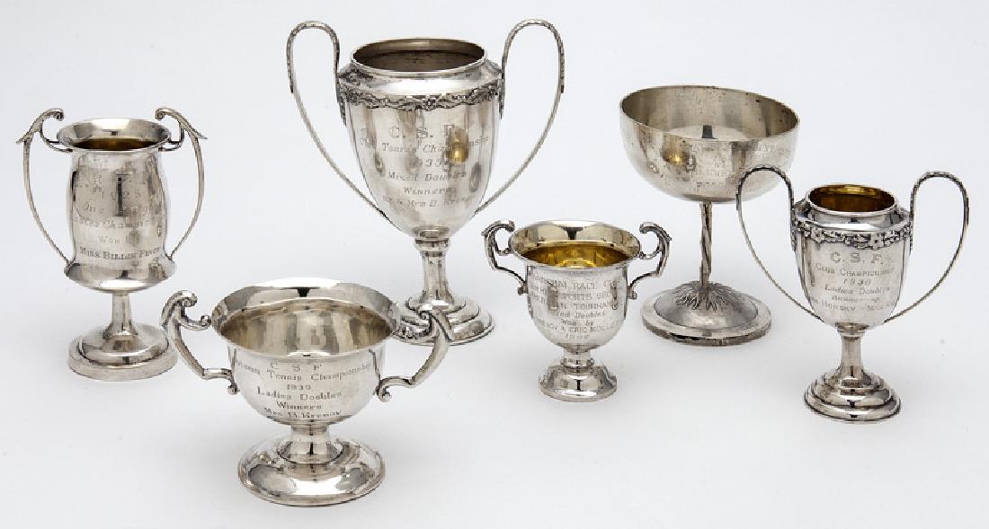 (6) Chinese silver trophies.: (6) Chinese silver trophies. Marked HC, Qi Chang, Zee Sung Silver, M. Silver, Shaoying Tang TC. 26.6 ozt. (828.8 g.). Tallest: 6.375"H, Circa - 1926-1939.
