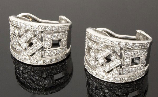 A pair of Chimento 18K gold and diamond hoops,: containing 116 round brilliant cut diamonds, 2.0 cts. approximate, G-H color, VS2 - SI2 clarity, 11.0 grams. Circa - 2000.