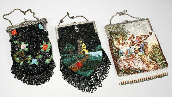(3) Vintage beaded purses with metal frame: closures including: (1) portrait purse, the reverse being tapestry; (1) black beaded bag with floral elements; (1) black scenic bag. Tallest: 11"H, Circa - 1900.