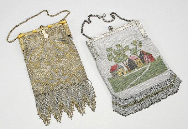 (2) Vintage beaded purses with "jeweled" frames: including: (1) steel beaded purse having a geometric design; (1) steel beaded scenic purse depicting houses. Tallest: 11"H, Circa - 1850-1900.