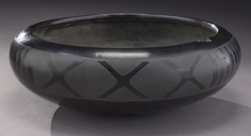 San Ildefonso blackware bowl,: San Ildefonso blackware bowl, with feather and X motif. Signed to underside, "Marie & Santana". 3.5"H x 10" Dia., Circa - 20th C.