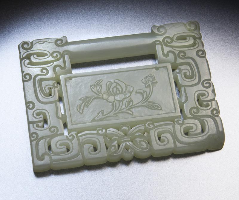 Chinese Qing carved jade child lock,: Chinese Qing carved jade child lock, one side depicting peony blossom, the other with four characters. 2.75"H x 3.125"L, Circa - 17th - 19th C.