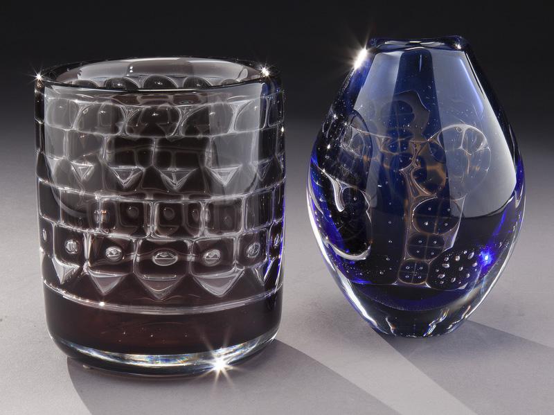 (2) Artistic Orrefors glass vases,: (2) Artistic Orrefors glass vases, including: (1) Ingeborg Ludin. Signed to underside, "Orrefors / Ariel 552 O / Ingeborg Lundin"; and (1) Edvin Ohrstrom Ariel vase in the Flickan Och Duvan (Girl with