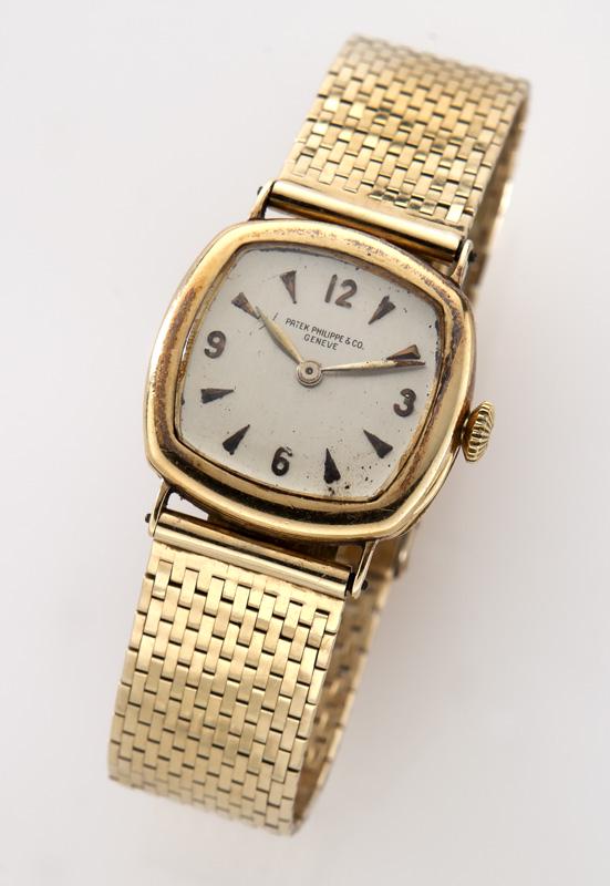 Art Deco Patek Philippe 18K gold watch: Art Deco Patek Philippe 18K gold watch with gold bracelet. Movement stamped, "Patek Philippe & Co Geneve Switzerland, 193218, 18 jewels, 8 adjustments, A. Newsalt Dayton O, case stamped, Patek Philipp