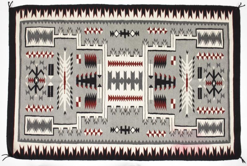 Klagetoh Storm pattern rug.: Klagetoh Storm pattern rug. 84"L x 59"W, Circa - 20th C. PROVENANCE: From the SMU in Taos Campus Collection.