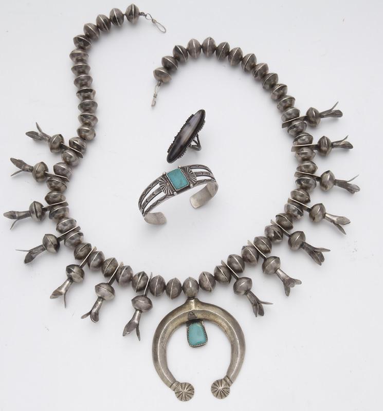 3 Pcs. Navajo Indian silver and turquoise jewelry: 3 Pcs. Navajo Indian silver and turquoise jewelry including: (1) squash blossom necklace, 26.5"L,; (1) bracelet; (1) agate ring, size 8. 254 g. Circa - Mid 20th C. PROVENANCE: From a Private Collectio
