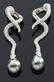 176: Chanel 18K gold diamond and Tahitian pearl earring