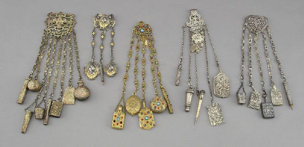 (5) Victorian sterling silver, metal chatelaines,: including: (1) sterling silver having five tools on chains, marked for Birmingham, 1866-67, indistinct maker's mark; (1) sterling silver having five tools and marked for London, 1896-1897; (1) white m