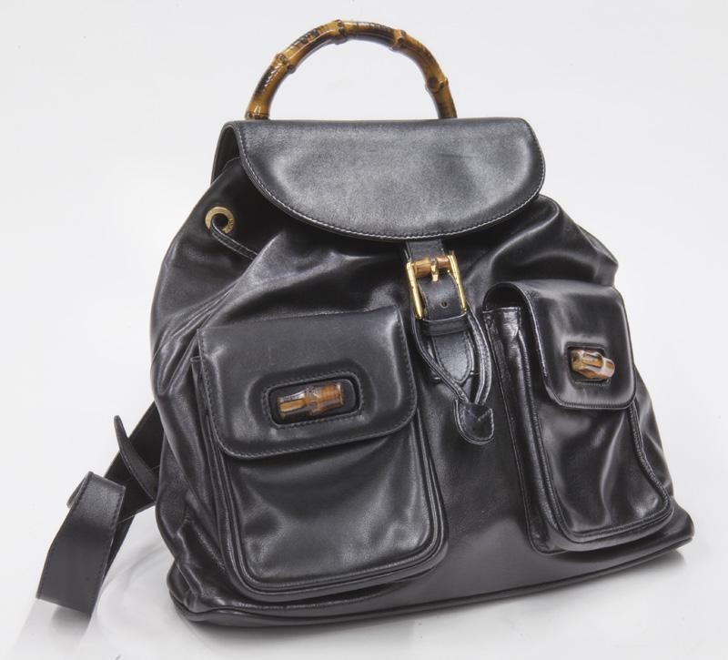 Gucci Bamboo Backpack Shoulder Bag: Gucci Bamboo Backpack Shoulder Bag in black smooth leather with bamboo handles and gold hardware, marked: 003.2058.0016. 11.75 x 11 x 4".
