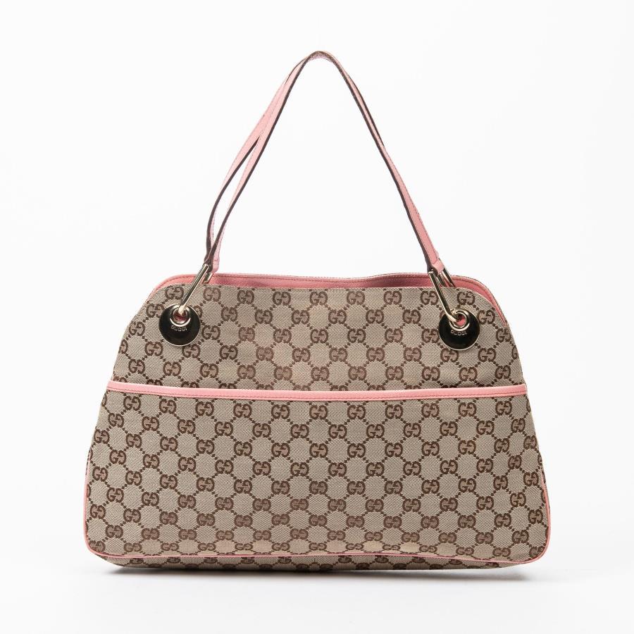 Gucci Eclipse Tote Shoulder Bag: Gucci Eclipse Tote Shoulder Bag in beige/pink monogrammed canvas with gold tone hardware, marked: 121023-204991. 9.5 x 15 x 2.75".