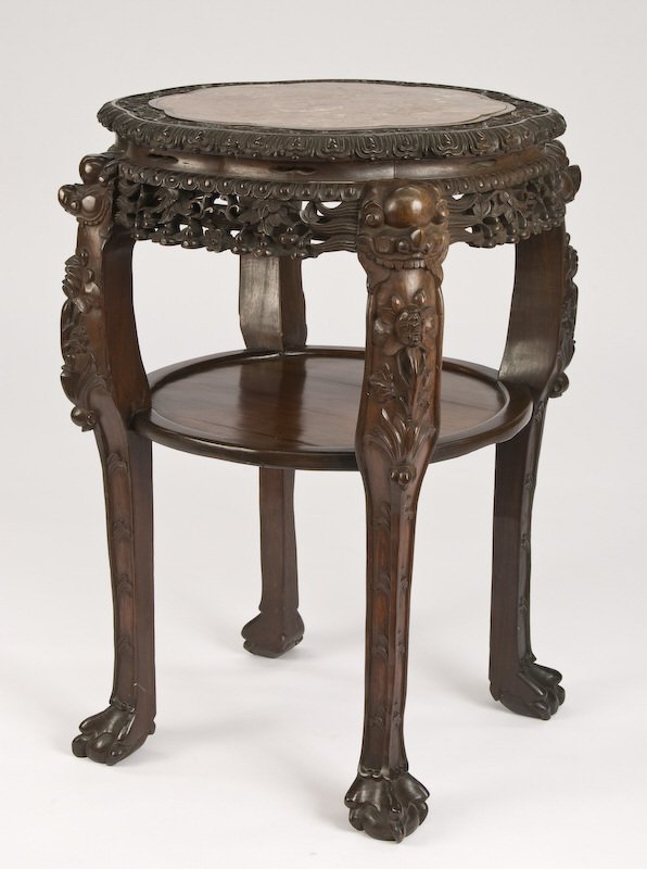 Chinese carved rosewood stand with marble top.