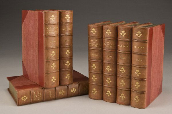 7 Vols. "The Life and Works of Charlotte Bronte: and Her Sisters" Haworth Edition: by Bronte, Charlotte; Anne; Emily and Mrs. Gaskell and published by John Murray, London. Bound in three quarters red leather with marble boards, gilt top edges, decor