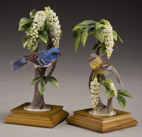 Pr. Dorothy Doughty porcelain birds, "Lazuli: Buntings and Choke Cherry", marked, "Passerina Amoena", "2391G" and "2110G", stamped for Royal Worcester, signed, "D. Doughty" on bases. Includes custom wood crates. Provenance: Estate of K.S. "Boots"