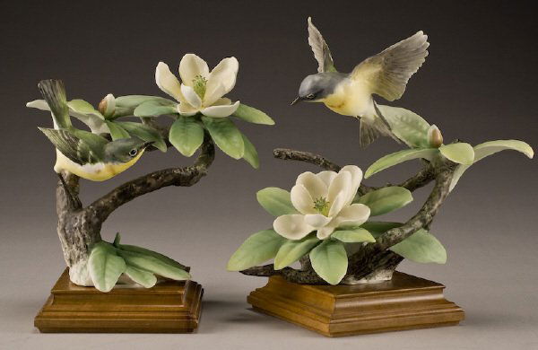 Pr. Dorothy Doughty porcelain birds, "Parula: Warblers and Sweet Bay", marked, "Parula Americana", "0717C" and "0259C", stamped for Royal Worcester, signed, "D. Doughty" on bases. Includes custom wood crates. Provenance: Estate of K.S. "Boots" Ad