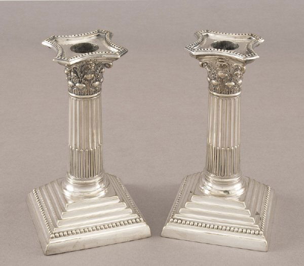 Pr. silver on copper candlesticks: in the form of Corinthian columns, removable drip pans, marked "WH and S B P MPA .45". 6"H x 3" Square, Circa - 1900.