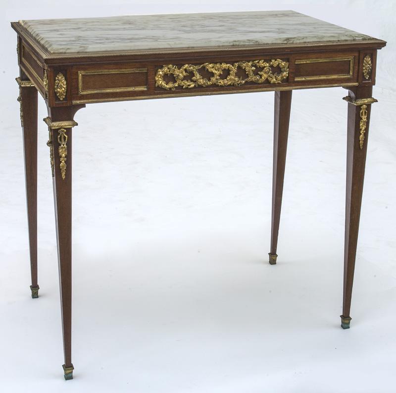 Louis XVI marble top console table,: the rectangular top supported by frieze having ormolu mounts in the form of floral wreaths, raised on tapered legs. 30.5"Hx 32"W x 20"D, Circa - Early 20th C.