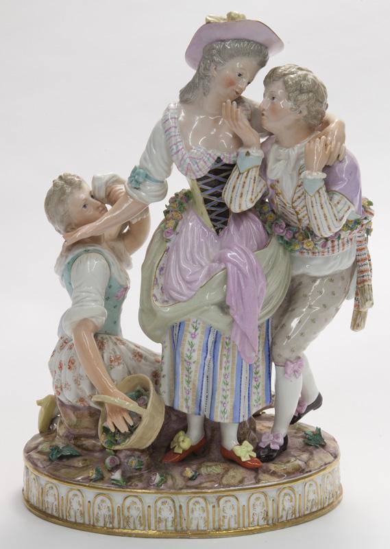 Meissen figural group,: featuring three lovers. With cross swords mark in blue underglaze. 12.5"H x 8.5"W, Circa - 19th C.