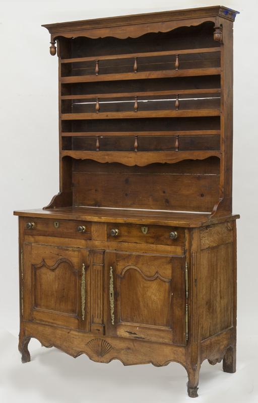 Country French carved walnut buffet,: the rectangular canted corner top over two drawer frieze atop two doors, raised on scalloped apron and cabriole feet. PROVENANCE: From the Vivian Young and Lady Primrose's Collection, Dallas, TX. 38"H