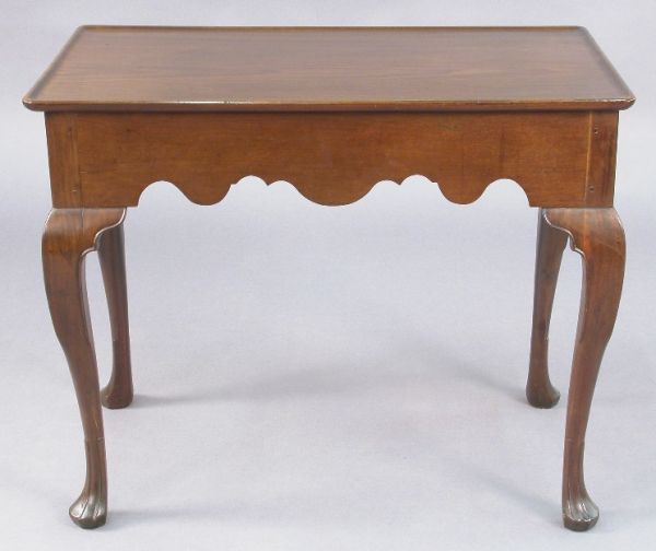A New England Queen Anne walnut tea table having - 3