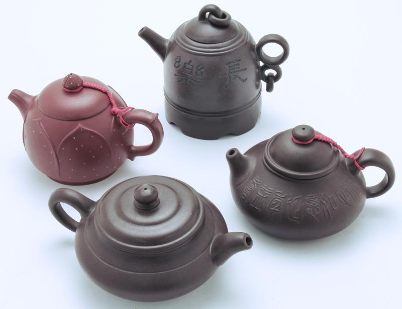 (4) Chinese Yixing teapots. (1 of 7)