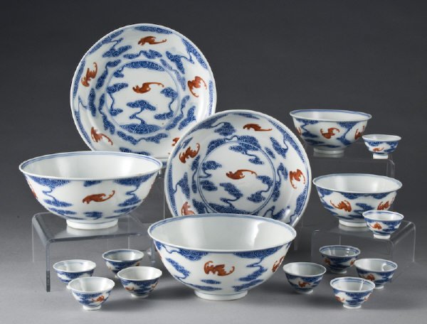 16 Pcs. Chinese Qing porcelain dinnerware decorate: 16 Pcs. Chinese Wing porcelain dinnerware decorated in blue and red finely painted to depict bats in clouds. Including: (14) bowls and (2) dishes. Marked for Great Qing Guangxu. Largest: 7.5" Dia., Ci