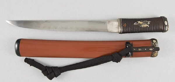 Japanese Tanto, Seki with shakudo scabbard having : Japanese Tanto, Seki with shakudo scabbard having a Hira-zukari blade with Ihori mune and Toran midare. The Haagari tang with two mekugi-ana signed: "Kuni Tsune Seki" with silver Habaki. The lacquered