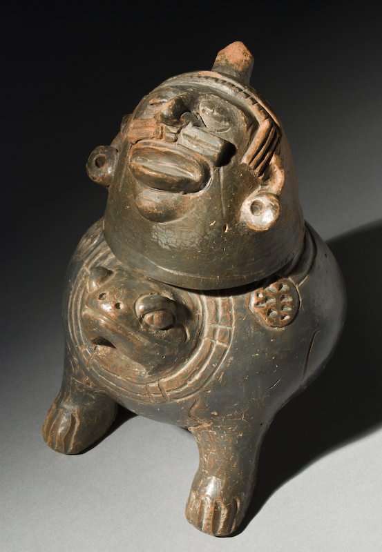Important zoomorphic Pre-Columbian plumbate vessel: Important zoomorphic Pre-Columbian plumbate vessel that is reduced fired with anthromorphic lid/cup depicting a Mayan frog vessel with possible post-mortem depiction of a human head. Extremely rare, i