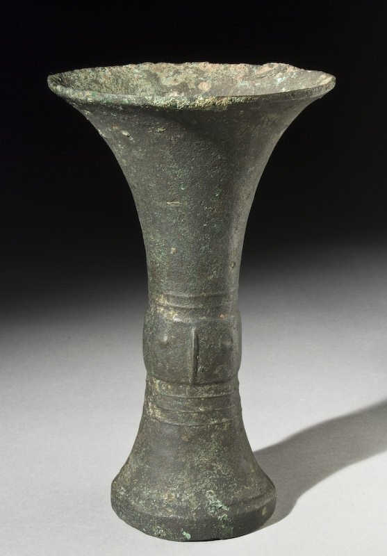 Shang Dynasty Gu vase having Taotie masks, origina: Shang Dynasty Gu vase having Taotie masks, original deposits include cuprite, malachite and azurite. Provenance: Ex-Alaska collection. 7.625"H x 5"Dia.,