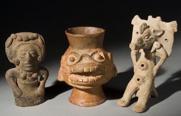 3 Pcs. Pre-Columbian pottery including: (1) large : 3 Pcs. Pre-Columbian pottery including: (1) large Mayan zoomorphic Coatimundi or Anteater Ocarina in buff terracotta, appearing intact and mineralized; (1) Postclassic plumbate headpot heavily restore