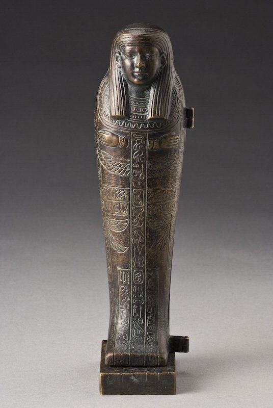 Bergman Vienna metamorphic bronze sculpture: the exterior modeled as a Egyptian sarcophagus with a hinged opening that reveals an exotic nude. Impressed amphora mark and inscribed, "Namgreb". Franz Bergman (Austrian, 1861-1936). 8.5"H, Circa - E