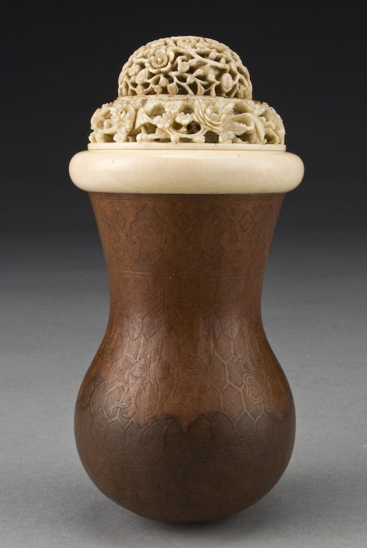 Chinese carved gourd cricket cage with ivory lid,: (International shipping IS NOT available on this item. This elephant ivory was imported legally into the United States.) the lid depicting carved plum blossoms, the gourd carved with honey bee hives. 