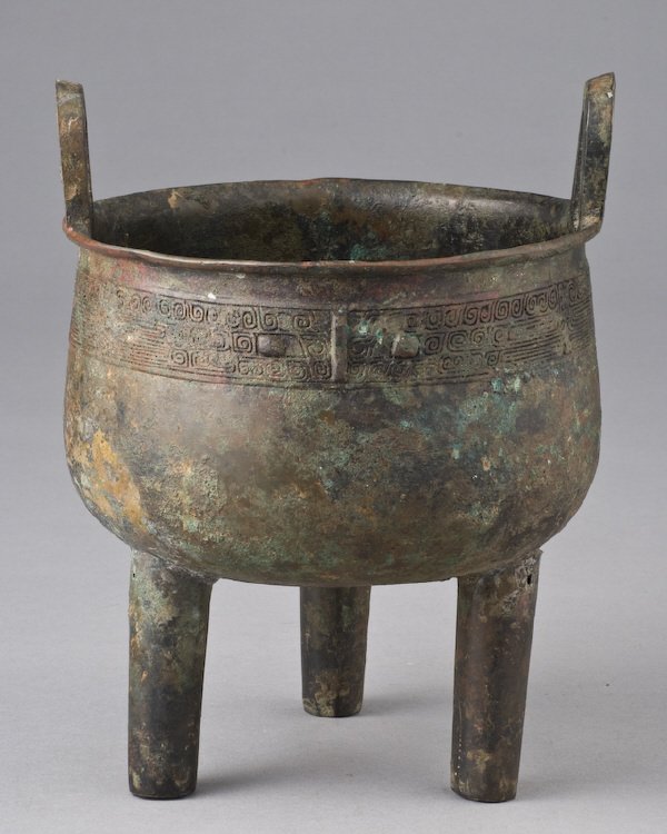 Chinese antique shang style bronze ding depicting: the face of the beast. 9.5"H x 7.25" Dia..