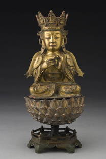 Chinese Ming dynasty gilt bronze Guanyin seated on: a lotus base. Guanyin: 9.5"H, with base: 15"H. Circa - 15th - 17th C.