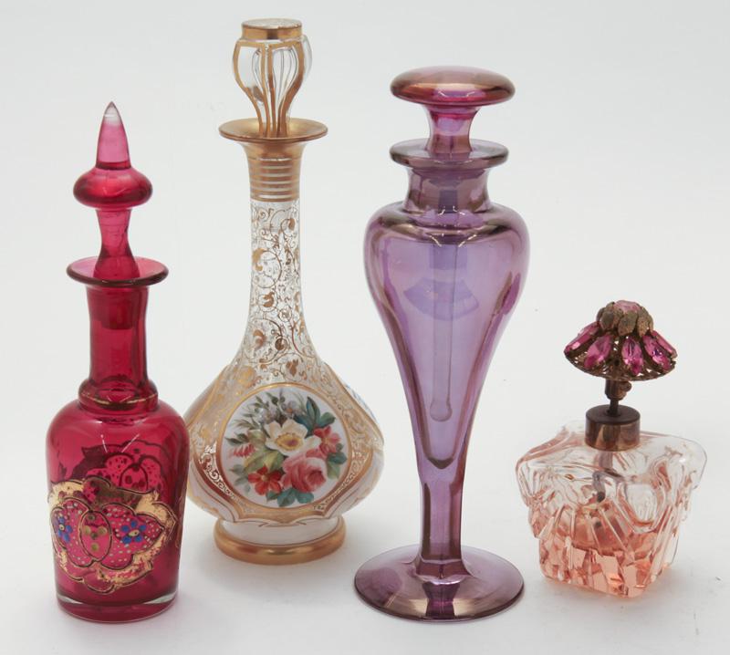 (4) Antique glass perfumes,: (4) Antique glass perfumes, including: (1) hand painted with portrait and bouquets; (1) with medallions and applied jewels; (1) with amber to purple coloration; (1) pink cut glass with jewel top. Tall